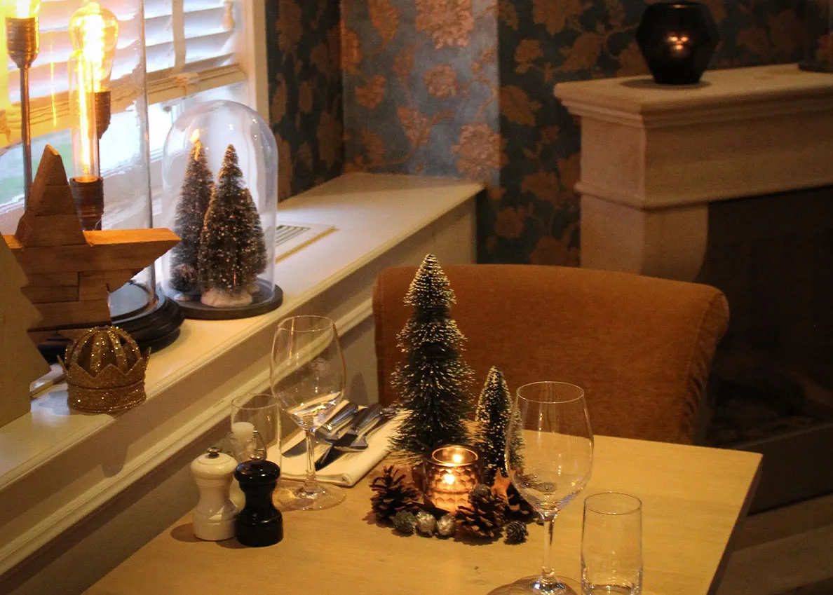 Elegantly set Christmas table at Restaurant Sophia